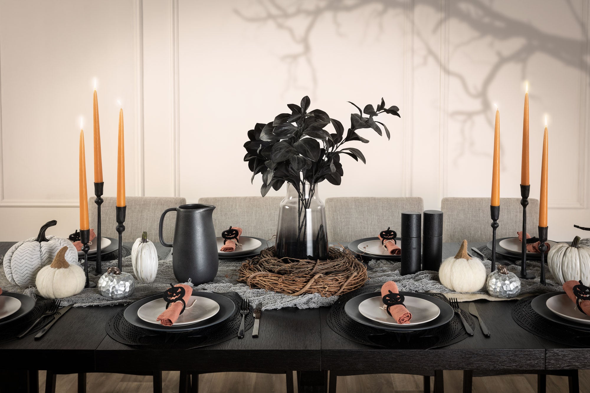 In this setup, we chose to dress our black Canadian Dark Oak Transformer Table in an orange, black, and grey colour palette. Our matching Transformer Chairs complete the look by bringing more light into the more gloomy table setting. 