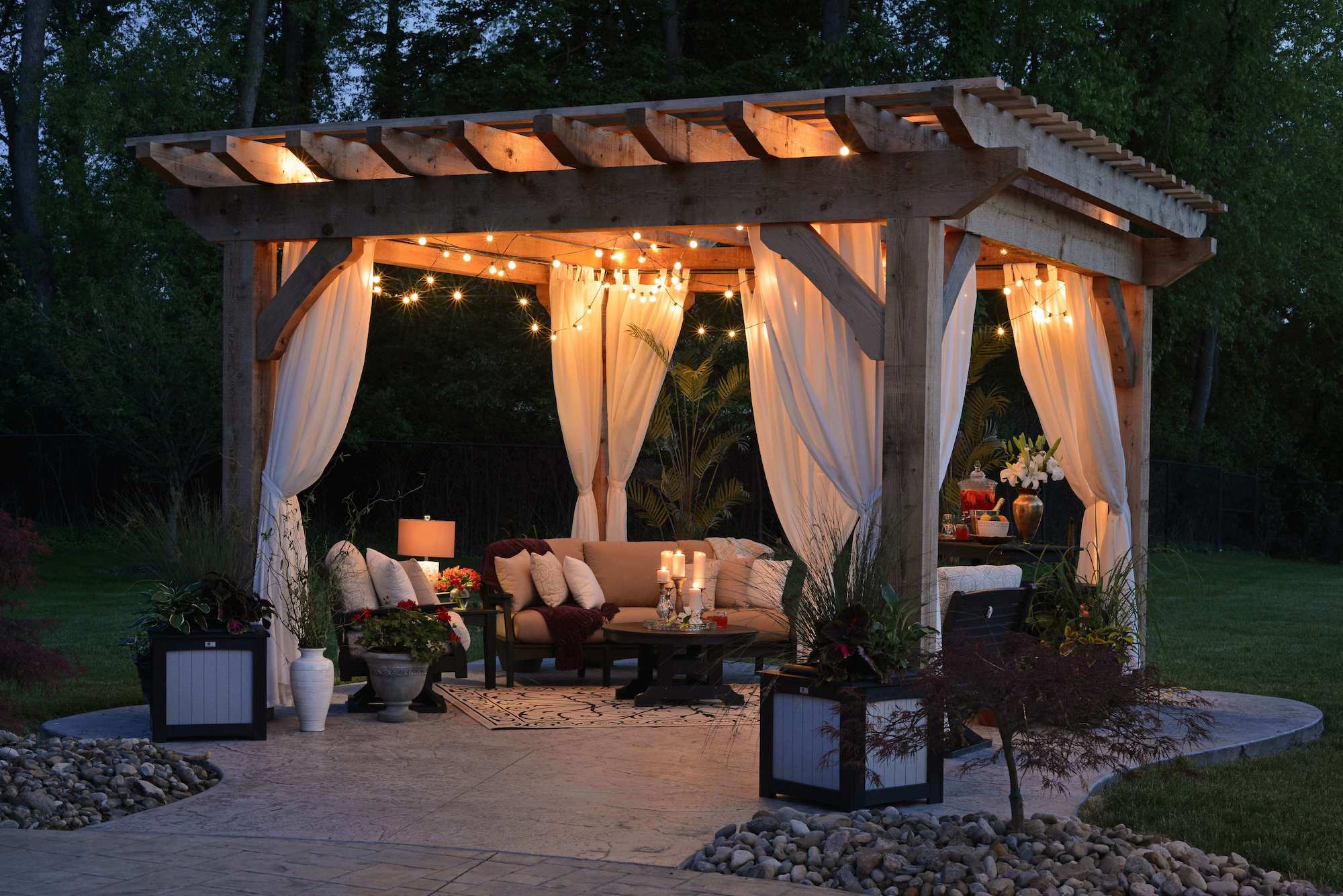 A backyard patio with fairy lights.