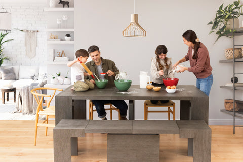 A family sitting at a dining room