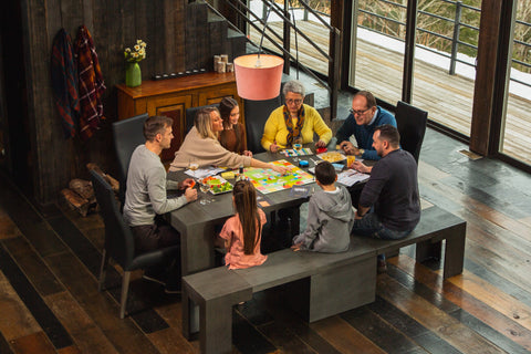 A family sitting at a dining room