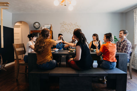 A family sitting at a dining table