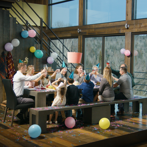 A family sitting at a dining table